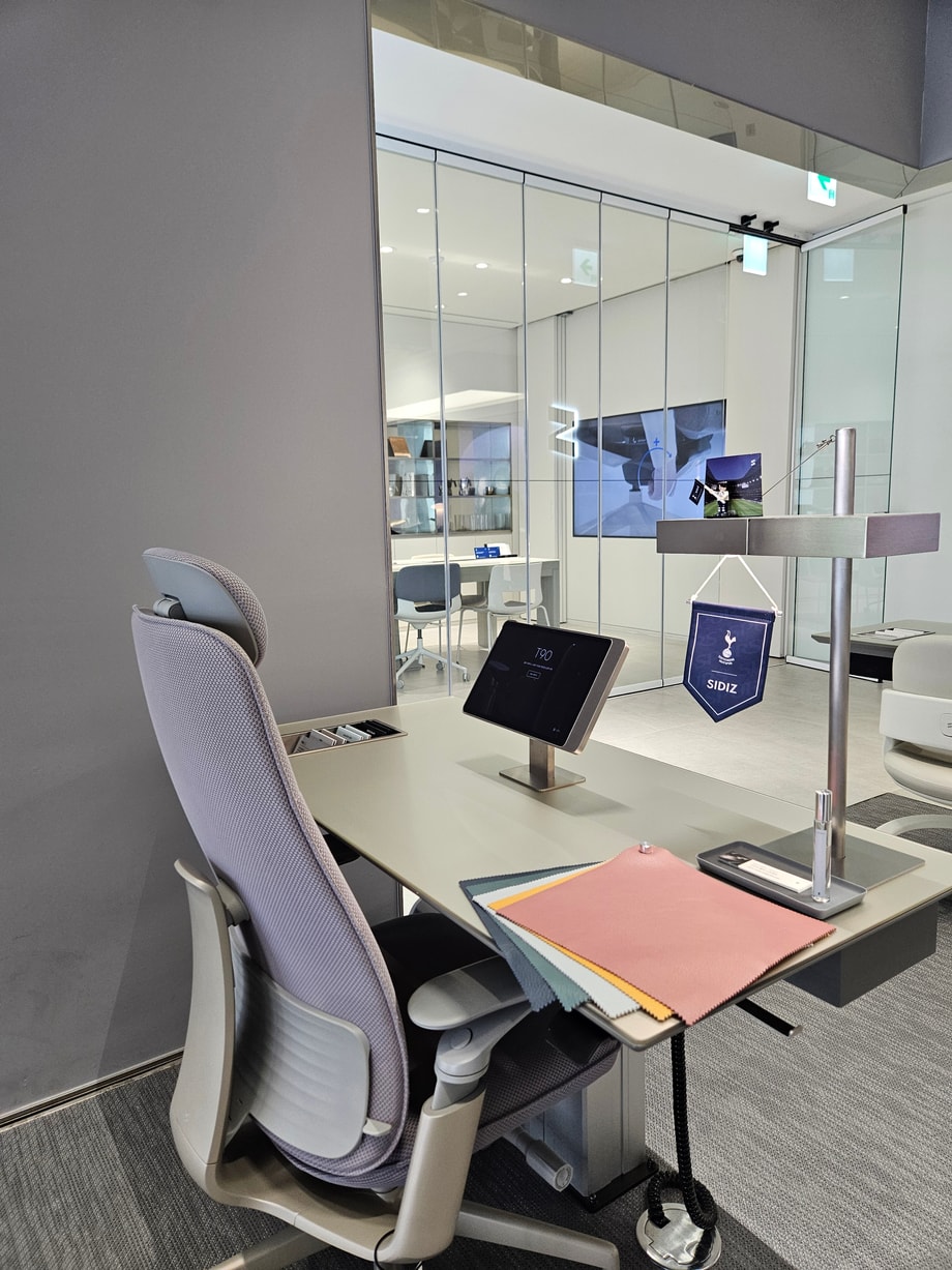 SIDIZ chair beside a digital tablet